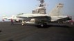 Taking off and landing on the USS George H.W. Bush Aircraft Carrier