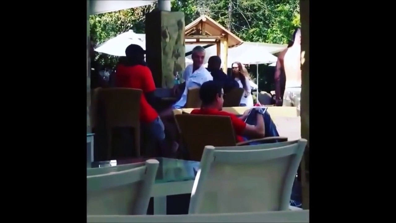 Justin Bieber Is Now Taking Photos & Giving Out Hugs - VIDEO