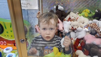 'This is a strange prize': Dad finds son stuck in claw machine