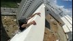 Man hangs off building in risky high-rise workout in Morocco