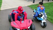 SUPERMAN vs SPIDERMAN POWER WHEELS RACE GIANT SURPRISE TOYS KIDS opening PLAYTIME AT THE PARK batman-b37