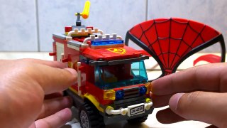 Lego fire engine behind the amazing spider man glass. very nice lego fire truck.