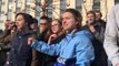 Russian police in body armor and helmets respond to corruption protesters