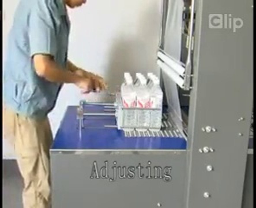 máy co màng lốc chai nước bán tự động , máy cắt dán màng co lốc chai bán tự động