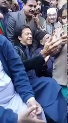 Imran Khan helping his young fans take selfies with him