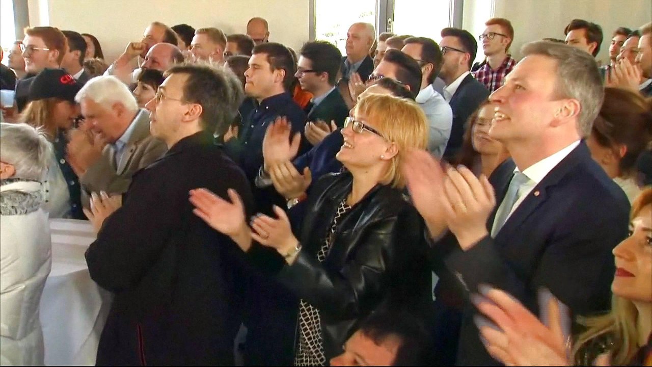 Merkel's party wins state election as German election starts