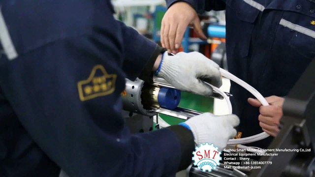 Well pump motor coil inserting machine