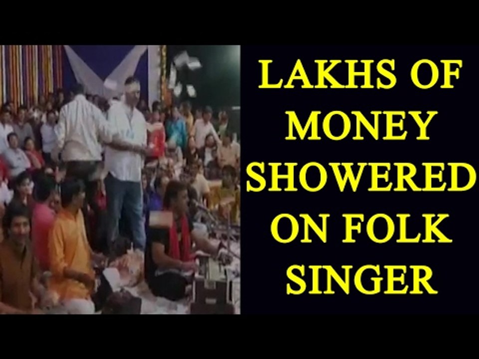 Gujarati folk singer was showered with lakhs of money: Watch video|Oneindia News