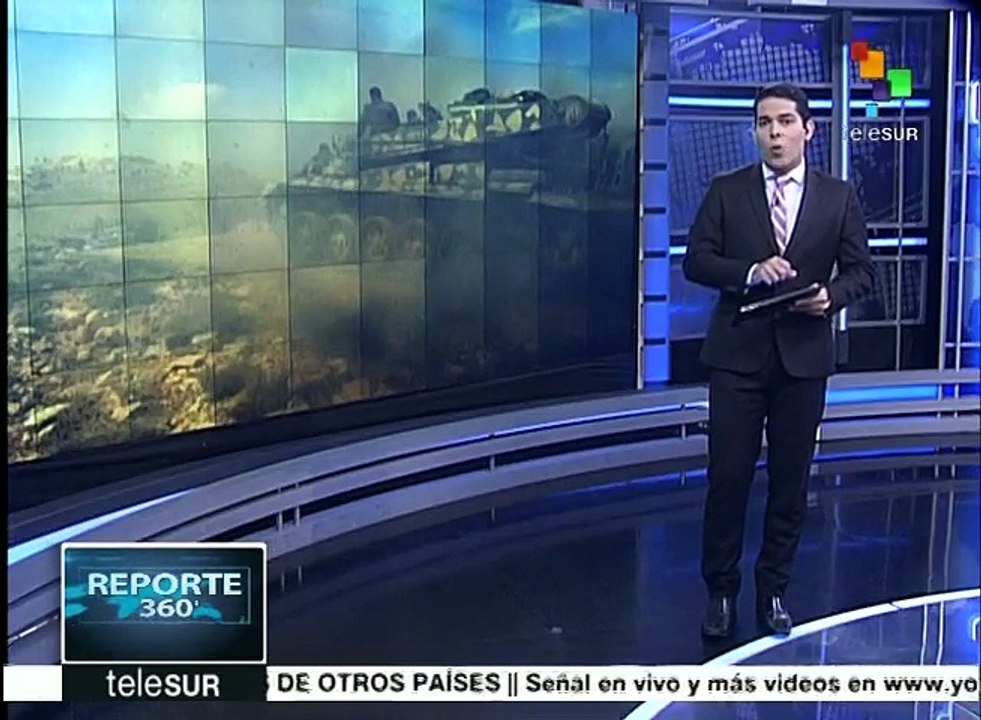 Cientos de combatientes armados y civiles sirios son evacuados de Homs