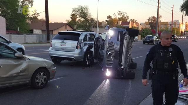 Uber Puts the Brakes on Driverless Cars After Accident