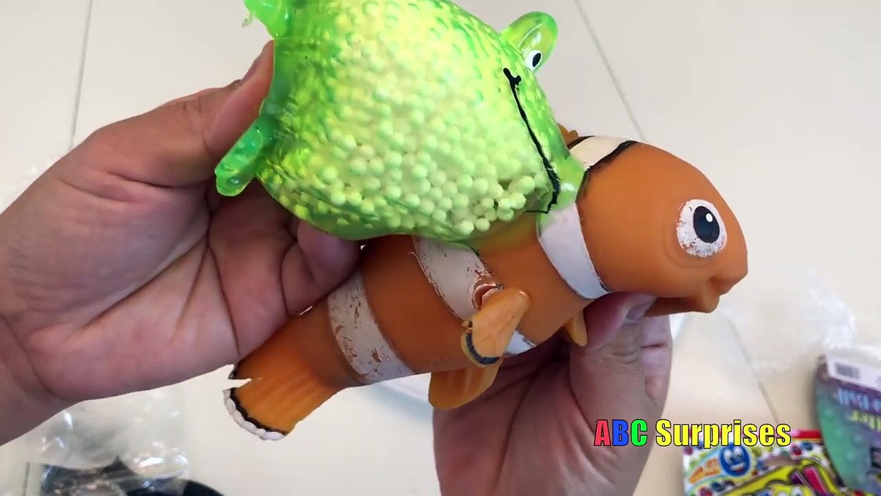 Cutting Open FINDING NEMO Squishy Toy GLITTER Stress Ball Slime