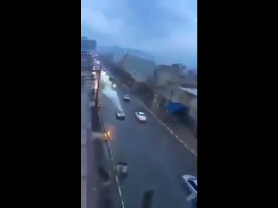 The astonishing moment lightning hits a car and...