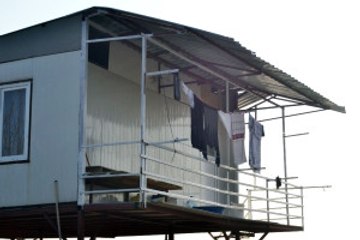 Katliam Evinden Geriye Askıda Asılı Çamaşır ve Küçükbaş Hayvanlar Kaldı