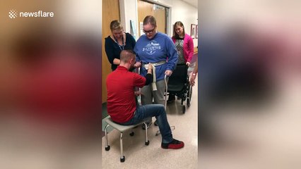 Woman walks for the first time after bleeding in her brain left her paralysed