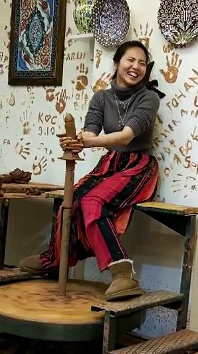 girl making dirty things with clay