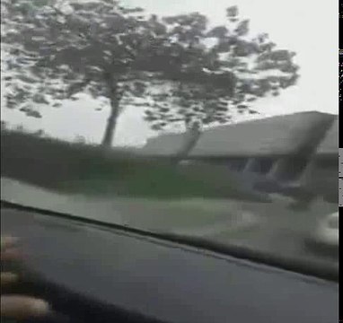 Pakistani truck driver on rage, drags the car on the the road