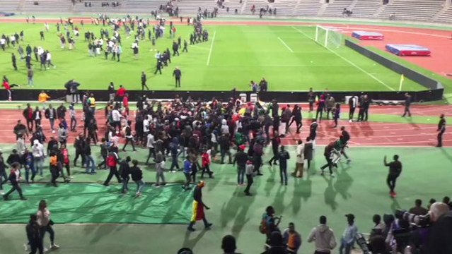 Pitch Invasion Interrupts Match Between Senegal and Ivory Coast