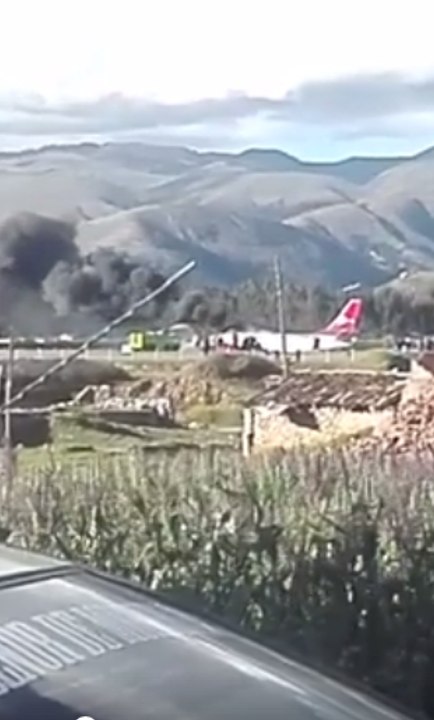 Black Smoke Rises From Wreckage of Peruvian Airlines Plane
