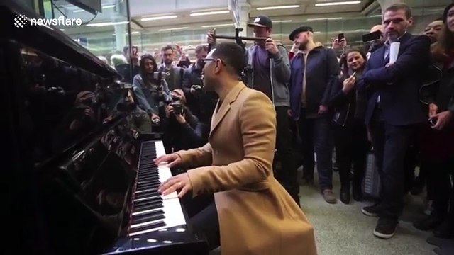 John Legend surprises bystanders with impromptu performance at St Pancras station