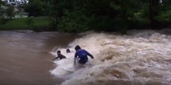 Thrill-Seeking Surfers Dive Into Raging Floodwaters at Murwillumbah Weir