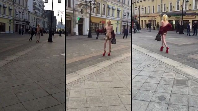 Une russe d'une beautée fatale marche dans la rue..