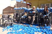 Örnek Dede-torun: Mavi Kapaklarla 88 Tekerlekli Sandalye