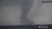 Storm chaser, Reed Timmer, records tornadoes on the ground in Texas