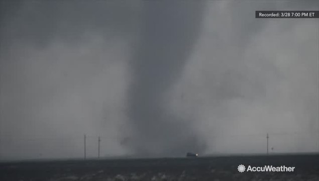Storm chaser, Reed Timmer, records tornadoes on the ground in Texas