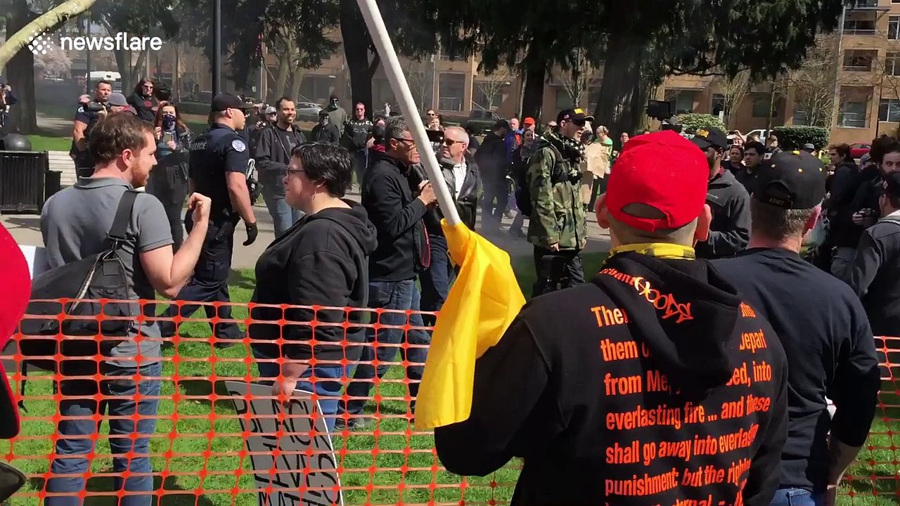 Anti-Trump protesters throw smoke grenades at pro-Trump rally