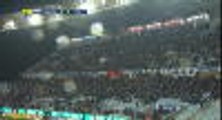 Bastia fans use their phones to light the pitch after a light spot goes off