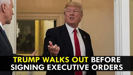 Trump walks out before signing executive orders