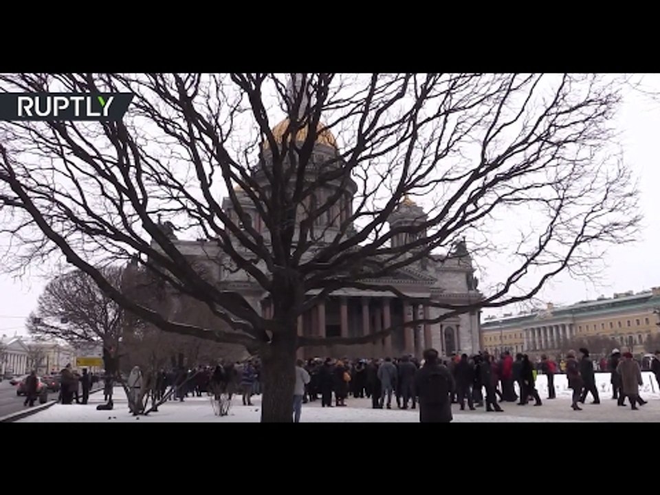 Crowds gather near iconic St. Isaac’s Cathedral to protest its transition to Russian Orthodox Church