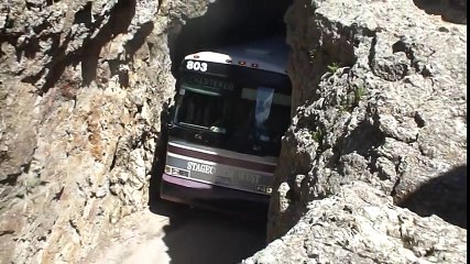 Charter Bus in Rock Tunnel