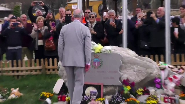 Prince Charles hugs survivor of deadly Italian earthquake