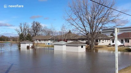 Gardens and streets flooded in Carman, Manitoba