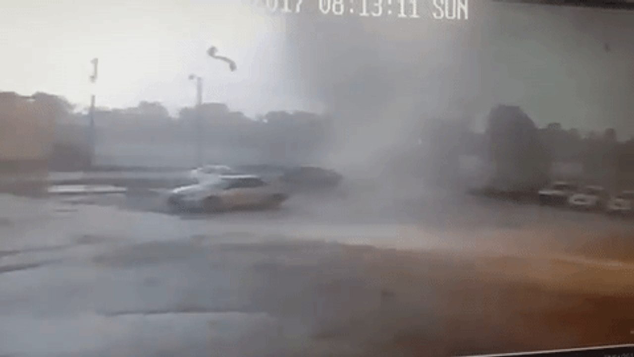 Tornado Flips Car at Lafayette Repair Shop