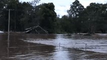 Stranded Family Saved From Roof of Building Just Before It Was Swept Away by Floods