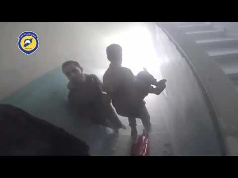 Rescuers Pull Children Out of Rubble Following Airstrikes in Eastern Damascus Suburb