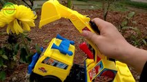 Excavators for kids _ Baby playing excavators destructive the yellow flowers   Toy for children-1jKxphS