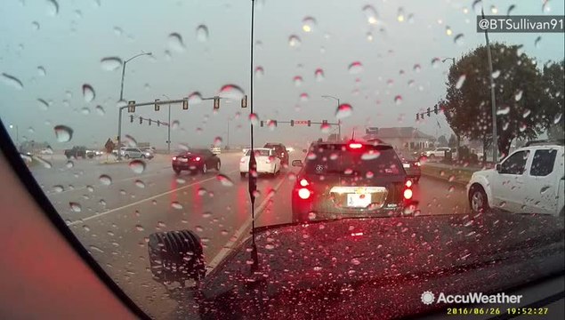 WHOA: Storm chaser captures lightning strike on busy street