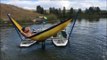 Man Chills Out on Hammock in the Middle of Peaceful Lake