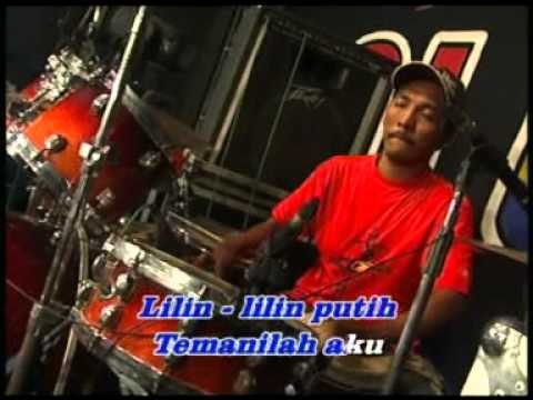 Evie Tamala - Lilin-Lilin Putih [Official Music Video]
