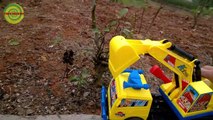 Excavators for kids _ Baby playing excavators destructive the yellow flowers   Toy for children-1jKxp