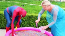 Frozen Elsa & Spiderman Buried Head in Orbeez sand surprise vs Joker Pranks Fun Superhero Real Life--Nw