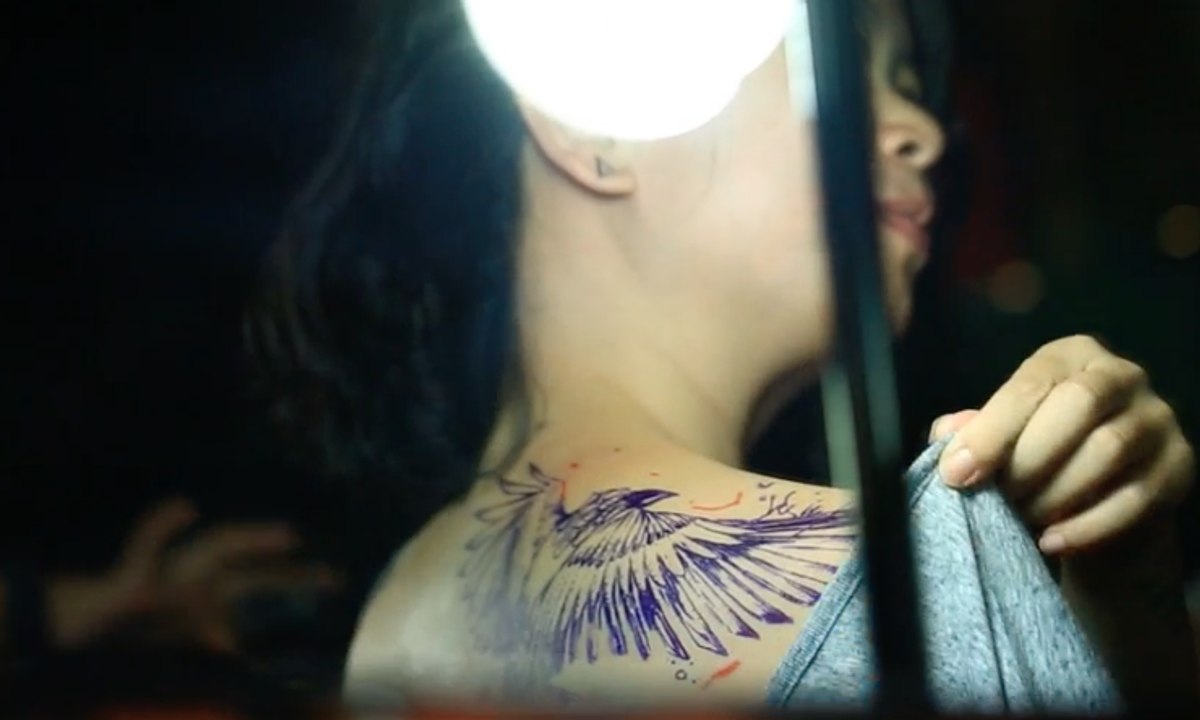 Perempuan dan Tato