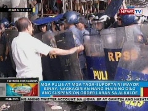 Mga pulis at mga taga-suporta ni Mayor Binay, nagkagirian nang ihain ang suspension order
