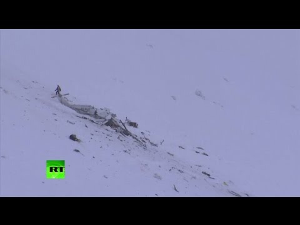 Helicopter crashes in Italian mountains, rescue crew retrieves bodies in heavy storm