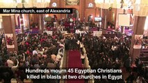 Egypt buries victims of church attacks