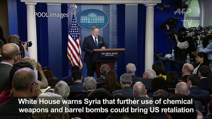 White House warns Syria on chemical, barrel bomb use