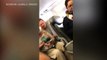 Man Being Dragged from overbooked United flight